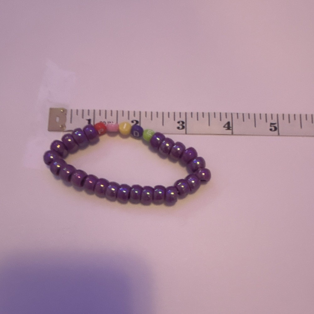 Handmade beaded PRIDE bracelet
