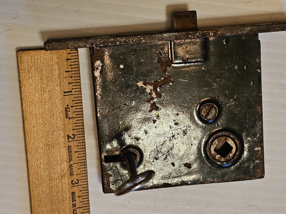 A OLD DOOR LOCK and KEY it WORKS. E