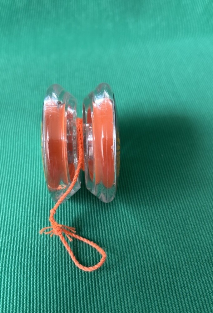 Cosmic Spin Yo-Yo NED Never Give Up Orange