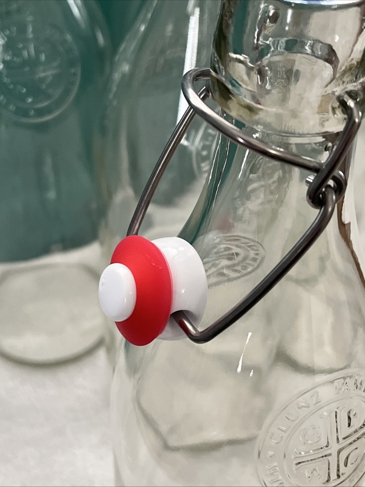 Six Empty Wine Bottles With Stoppers Clear Glass
