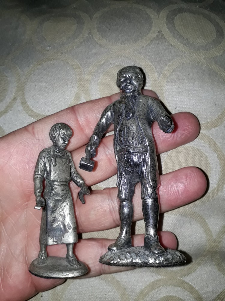 vintage silver plated figures of blacksmith & boy apprentice