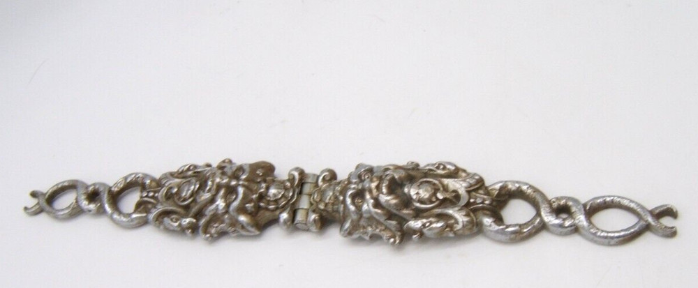 BRONZE SILVERPLATE NUTCRACKER W/ GROTESQUE LION ON FRONT OF HANDLE