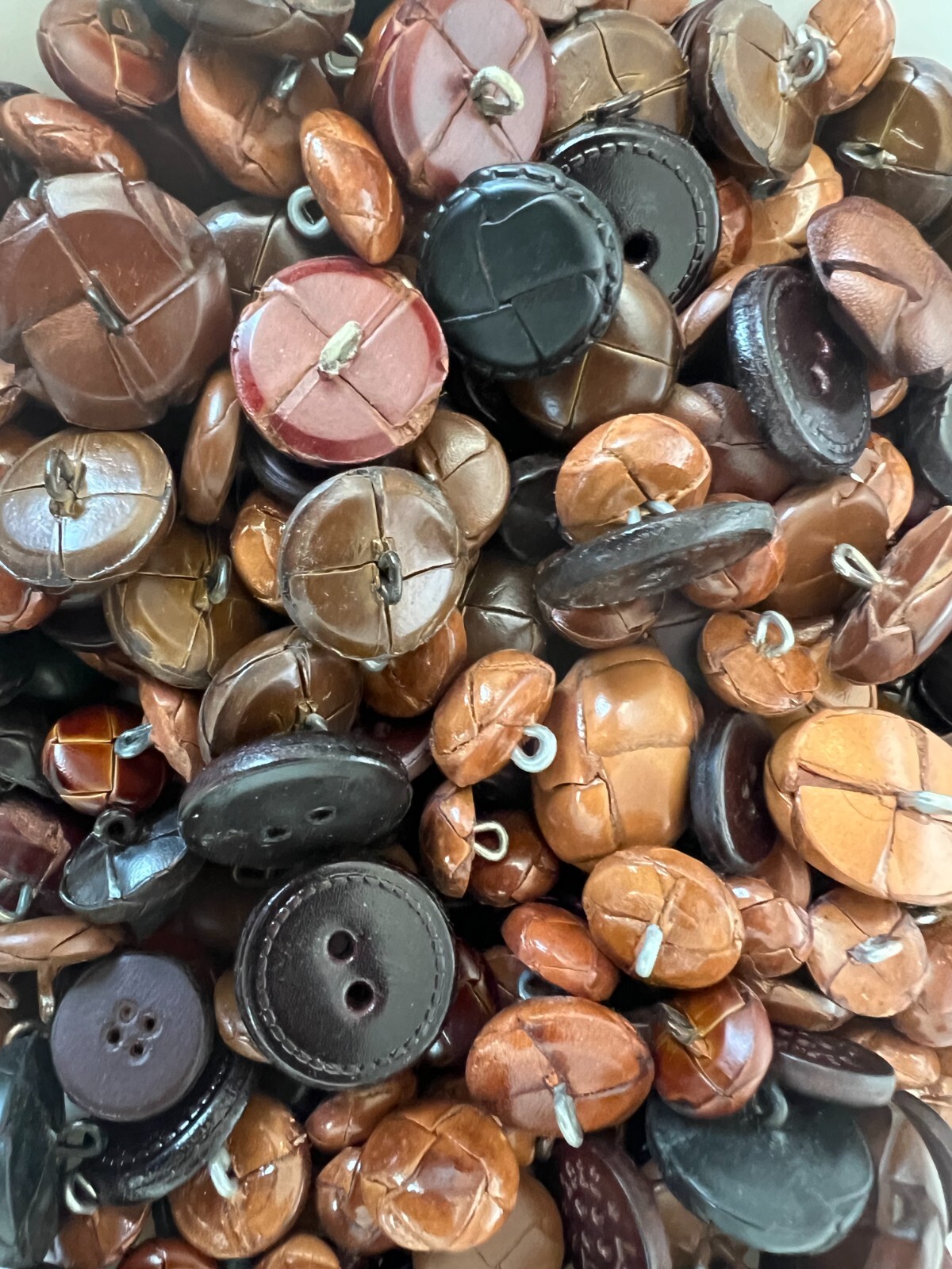GENUINE LEATHER BUTTONS-OVERSTOCK SALE-SELLING IN ASSORTED 12 LB LOTS