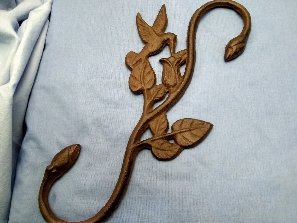 Hummingbird plant hook cast iron.