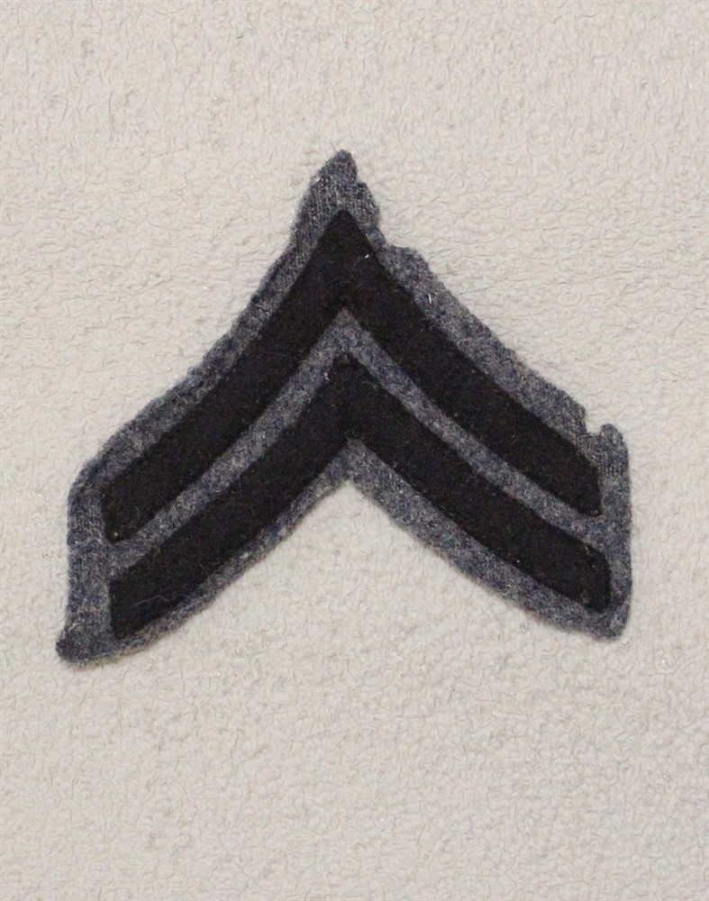 Cadet Chevron 170: Sergeant - WWII era black on blue/gray, 3 1/2"