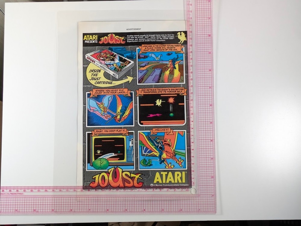 Joust on Atari 2600 Advertisement - Laminated From Original Comic Book