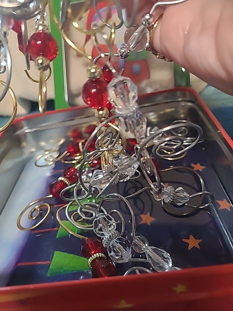 TIN WITH MANY CHRISTMAS HOOKS (BIN M)