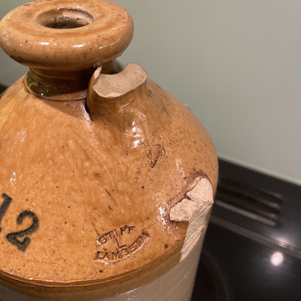 stoneware flagon. White Bros. Ginger Beer. Broken Handle