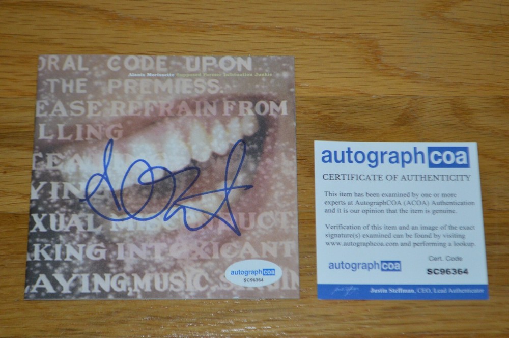 Alanis Morissette Signed "Supposed Former ...." CD Booklet with AUTOGRAPH COA