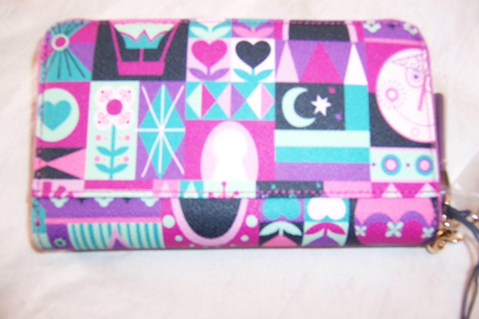 Authentic DisneyParks "It's a Small World" wristlet wallet; NWT; Dooney & Bourke