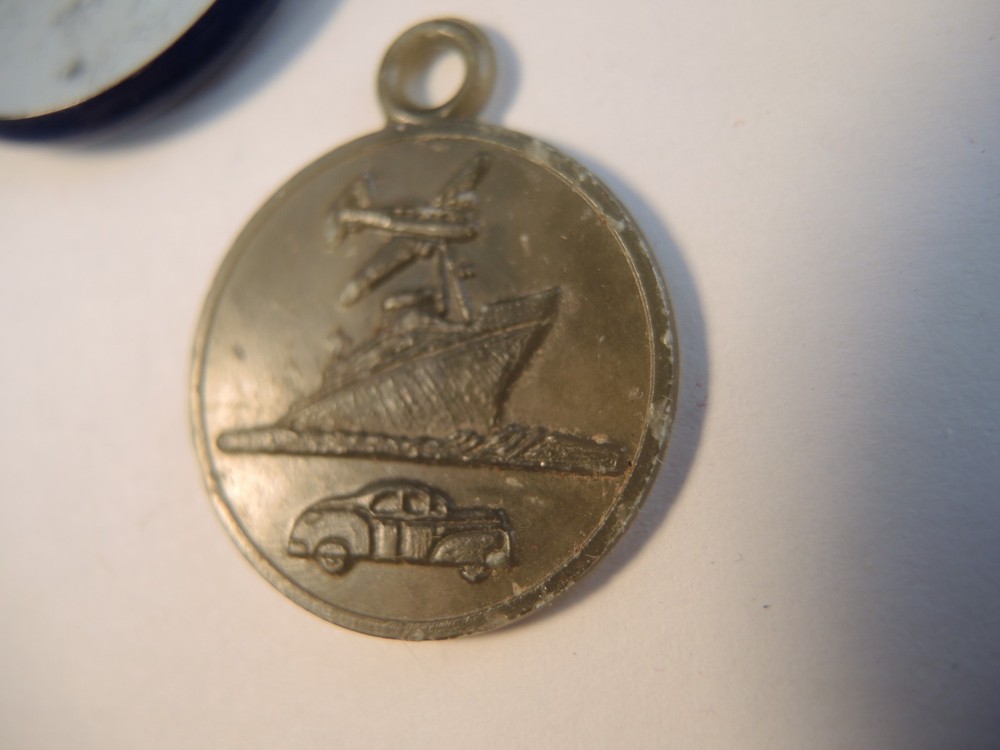 2 WW II liberty loan pins & St. Christopher plastic medal