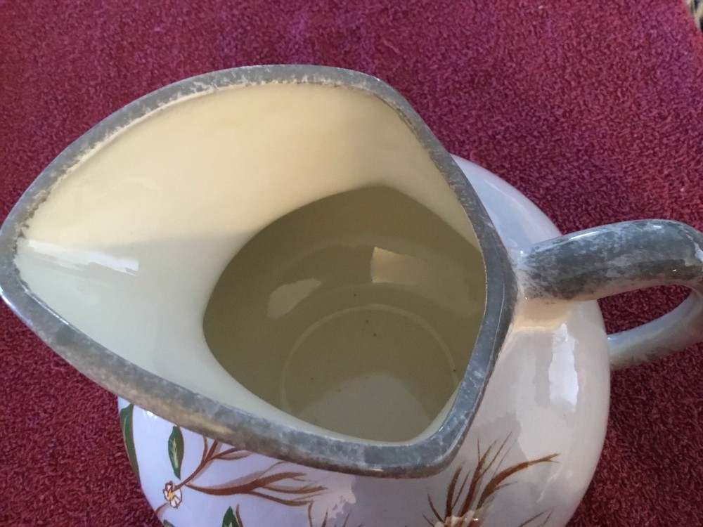 Oriental flower design ceramic water pitcher