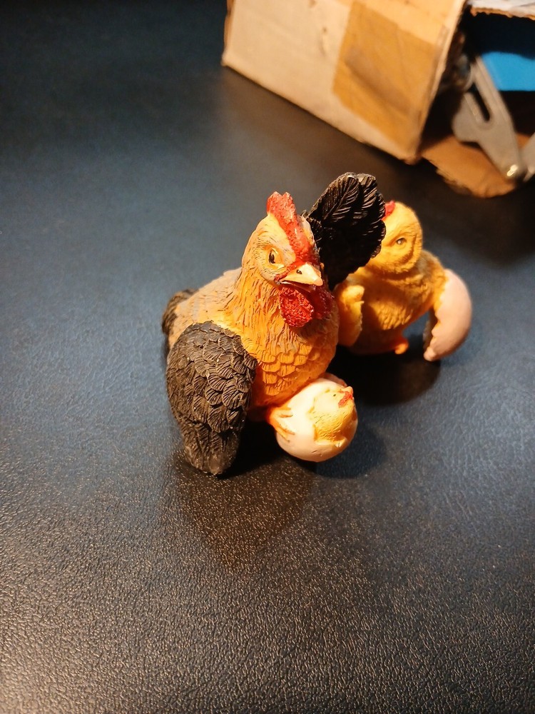 Rooster And Chick Collectable Figurines Hard Plastic?