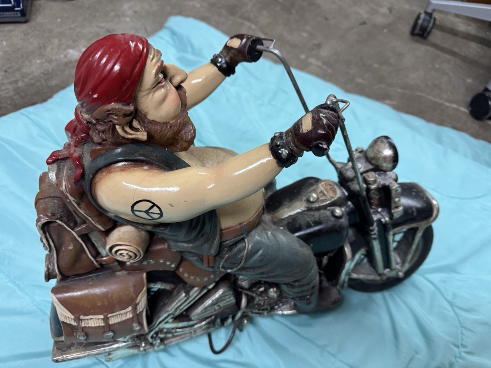 Vintage Motorcycle Figurine On Vintage Bike