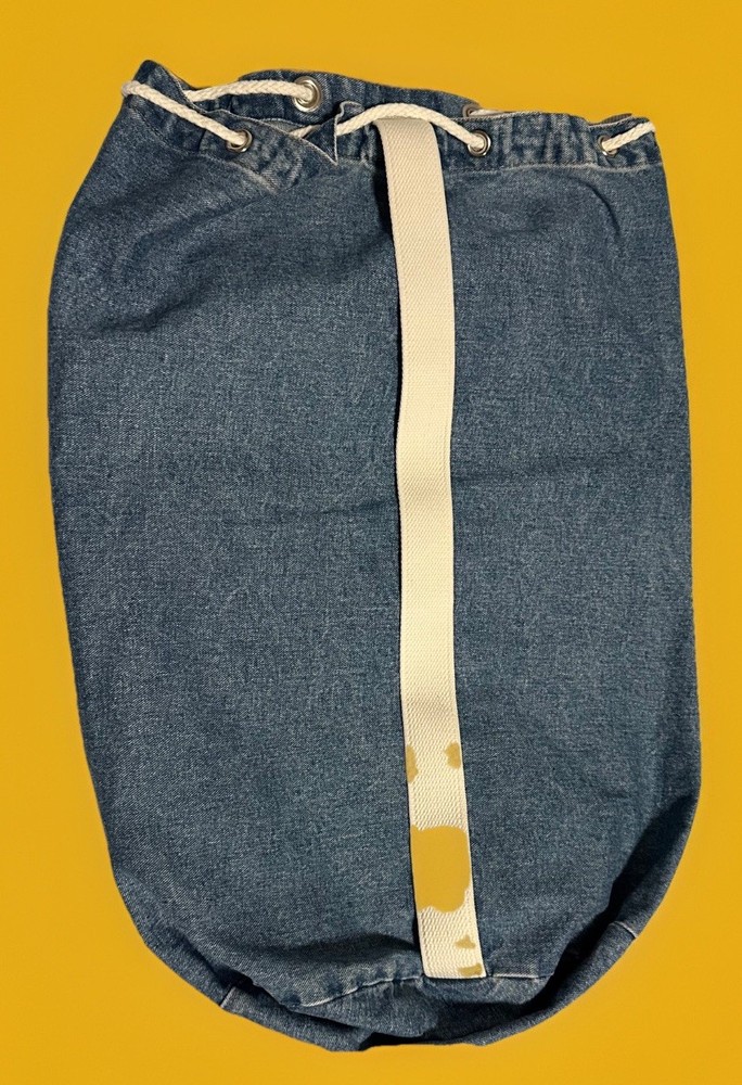 A vintage denim drawstring laundry bag 23 X 17.5.