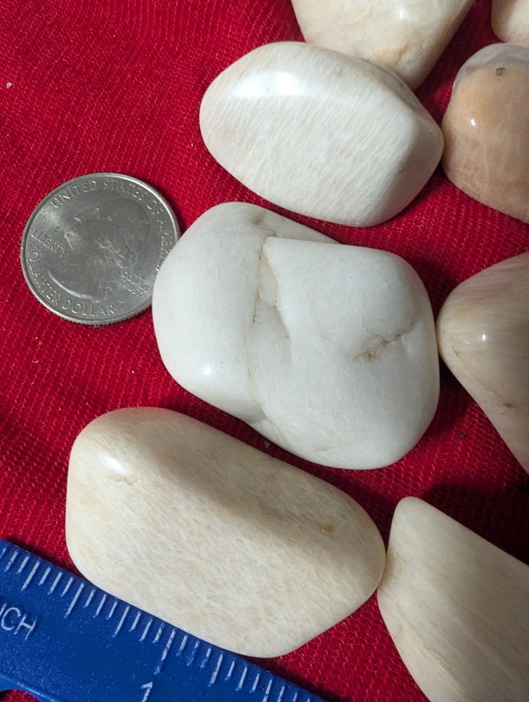 2 Off white large tumbled gemstones per lot.