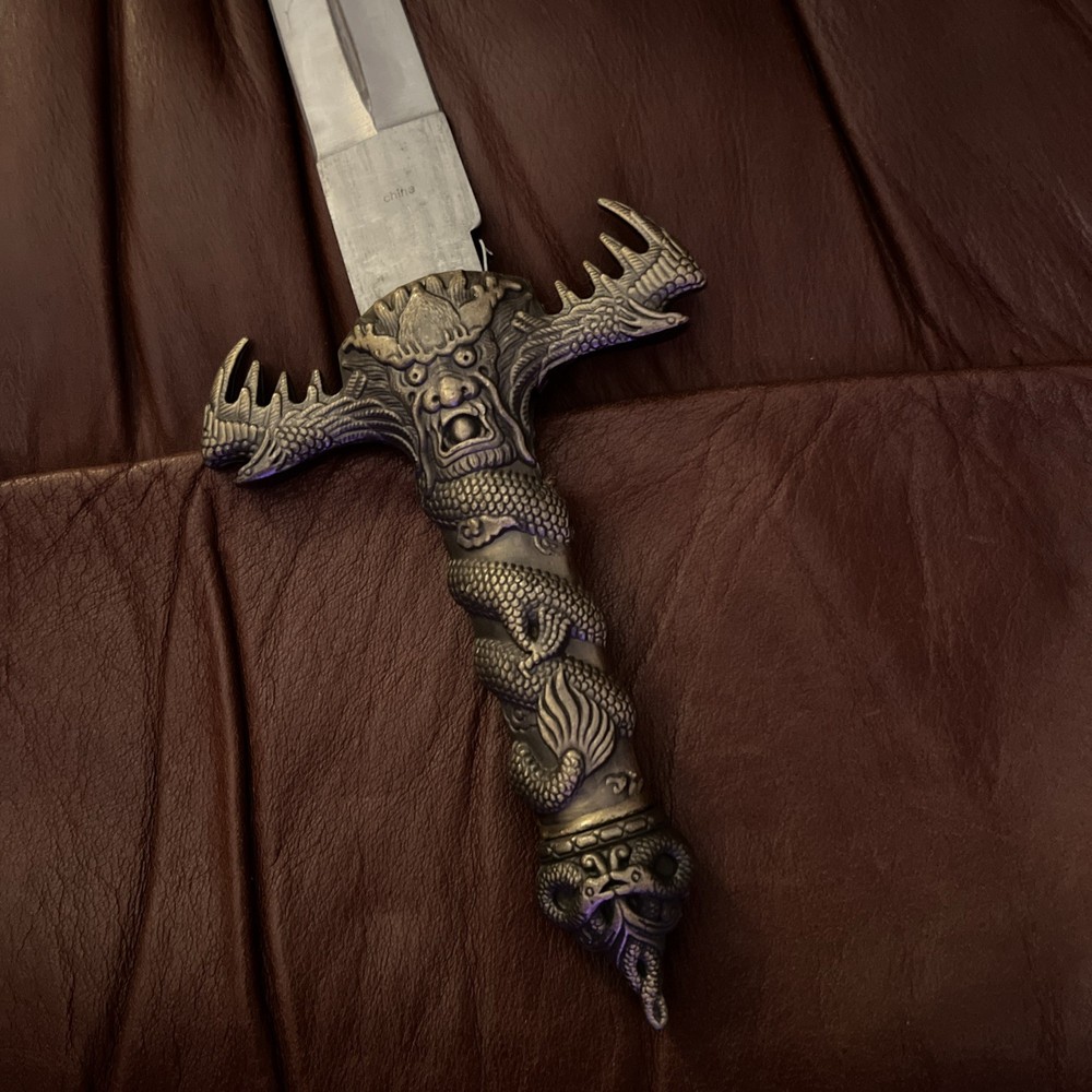 Metal Dagger with Lions Head