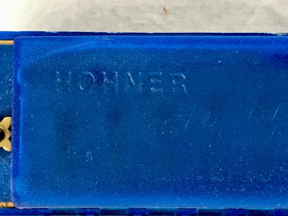 Two Hohner Harmonicas. Hohner Echo (C) & Blue Hohner (C)