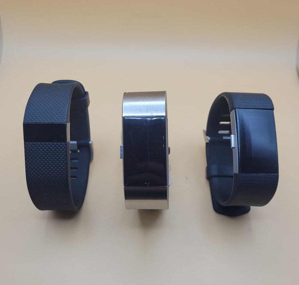 3 Pre-Owned Fitbit Watches & Charger - 2 Tested & Working (Cracks) & 1 Untested