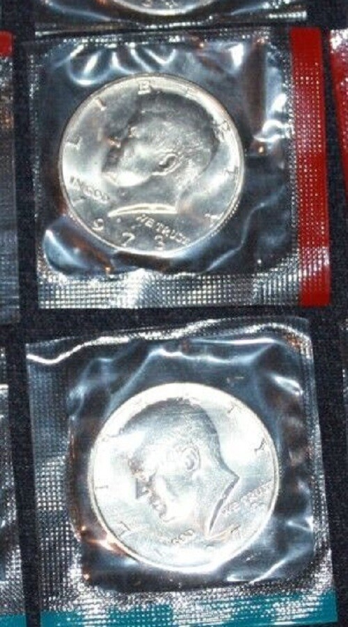 Two BU 1973 PD  50c Kennedy half dollar Mint Set Cello  JFK