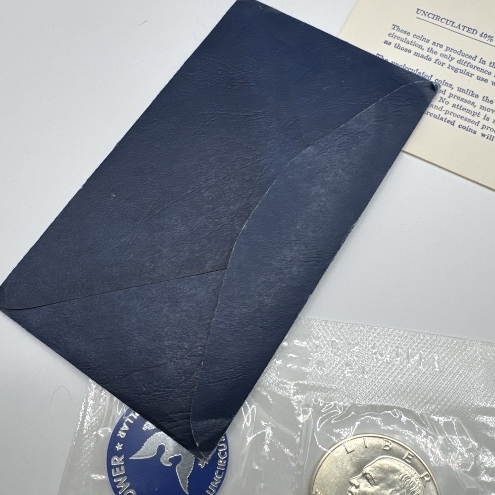 Uncirculated 1971 S Silver Eisenhower Dollar in Cello plus token