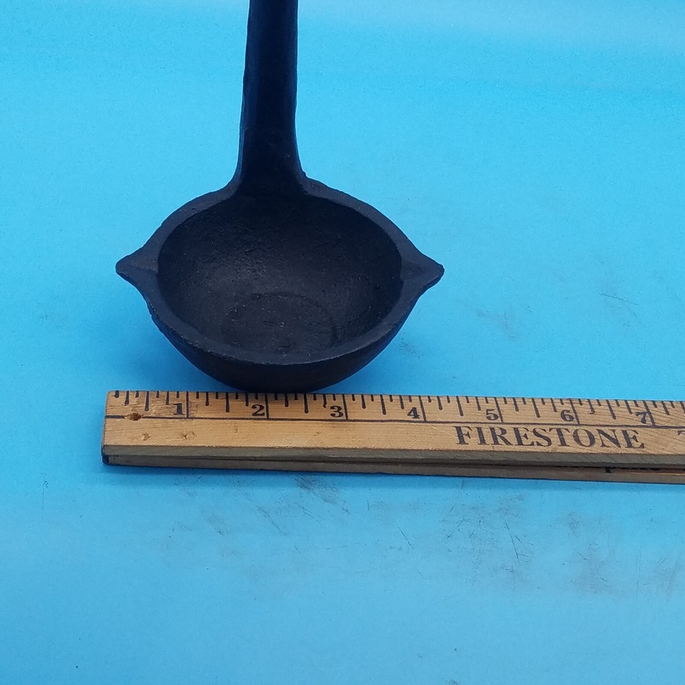 Cast iron double spout label unbranded 3"x 13 " overall
