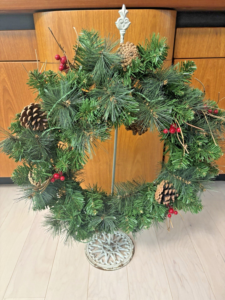 Vintage off-white distressed metal floor/table wreath holder