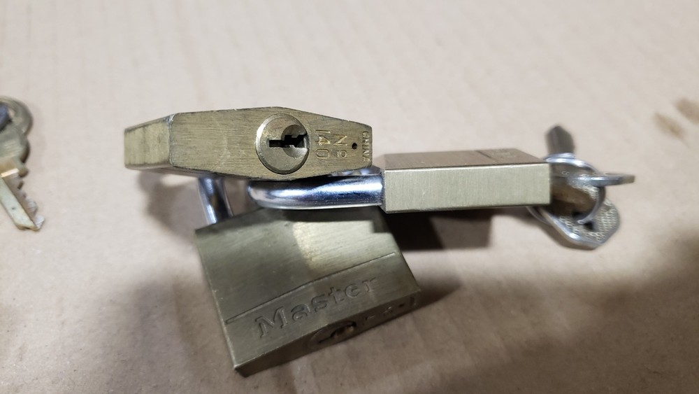 6 Master Locks Padlocks and 2 smaller Corbins