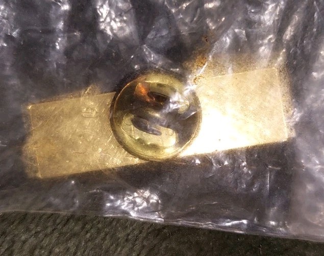 Vintage John Deere lapel or hat pin.