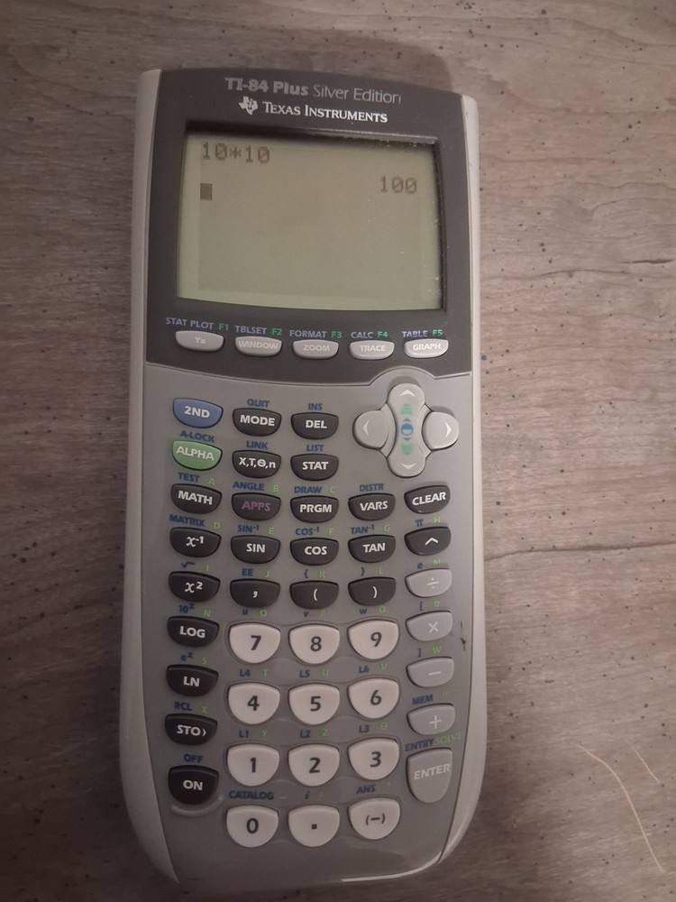 TEXAS INSTRUMENTS GRAPHING CALCULATOR TI-84 PLUS SILVER EDITION - READ DESCRIPTI