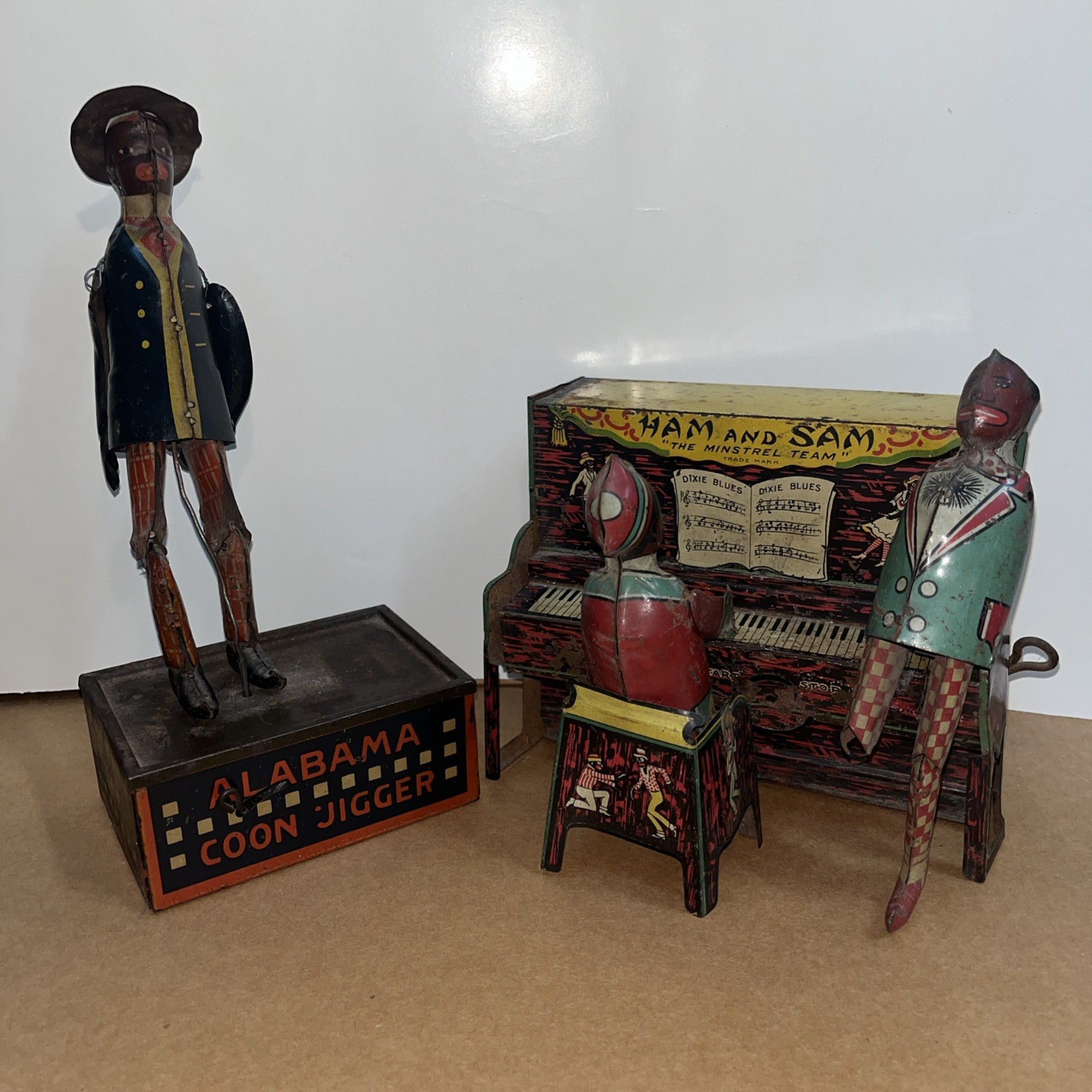 Set of 2 tin toys Ham and Sam The Minstrel Team & “TOMBO “Alabama Coon Jigger