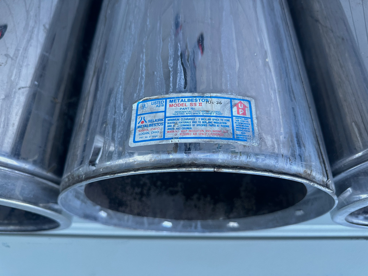 6x 10" diameter 36" length Selkirk packed stove pipes with storm collar and cap