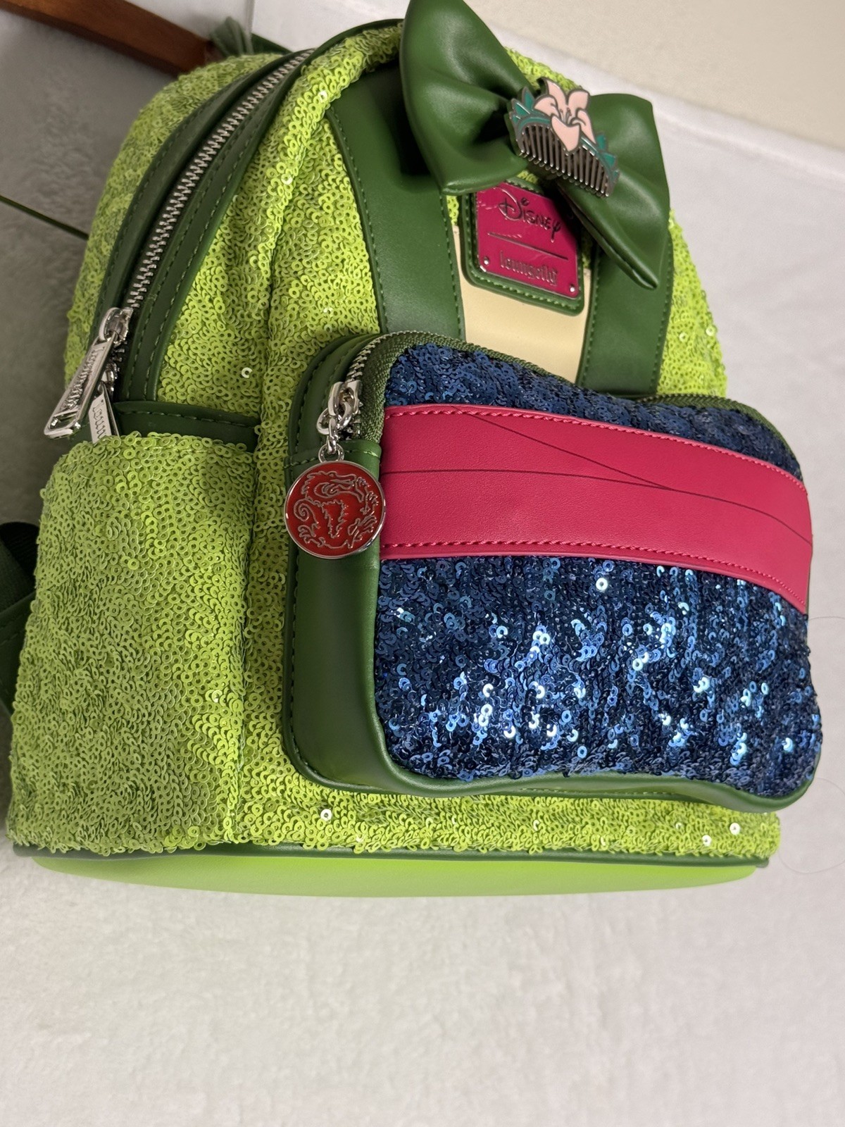 NEW EXCLUSIVE DROP: Loungefly Disney Princess Mulan Sequin Mini Backpack