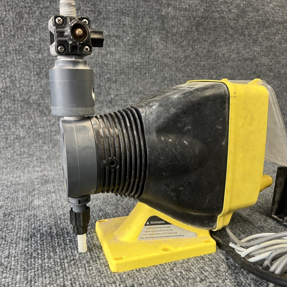 LMI Milton Roy AA751 120Vac Metering Pump W/Attached Programmable Divider Used