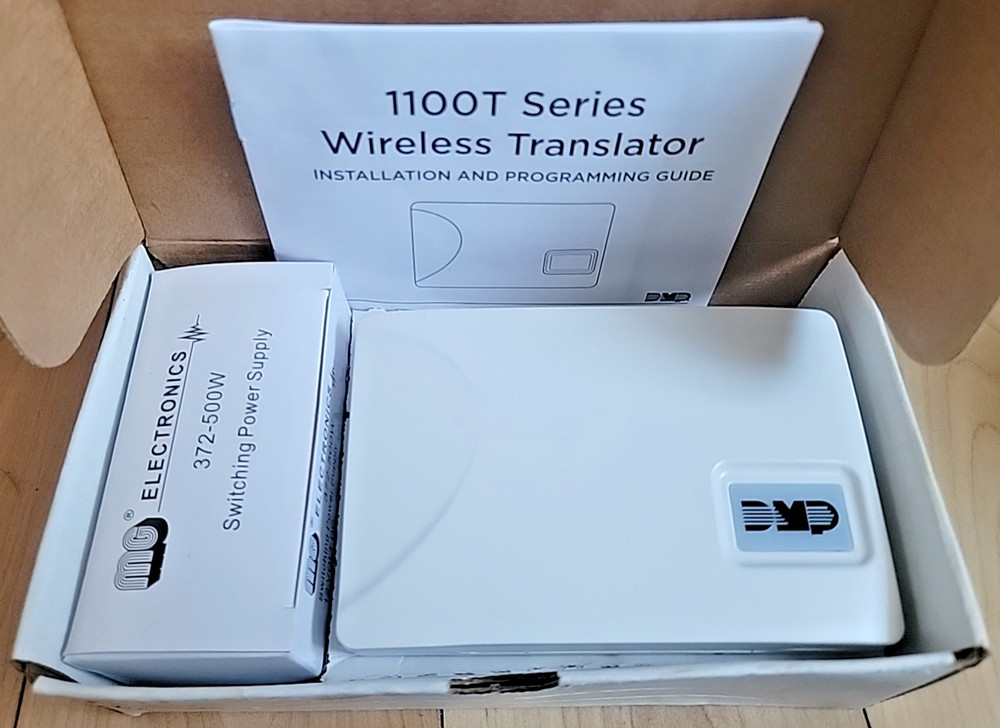 DMP 1100T Universal Wireless Translator Security System - NEW READ