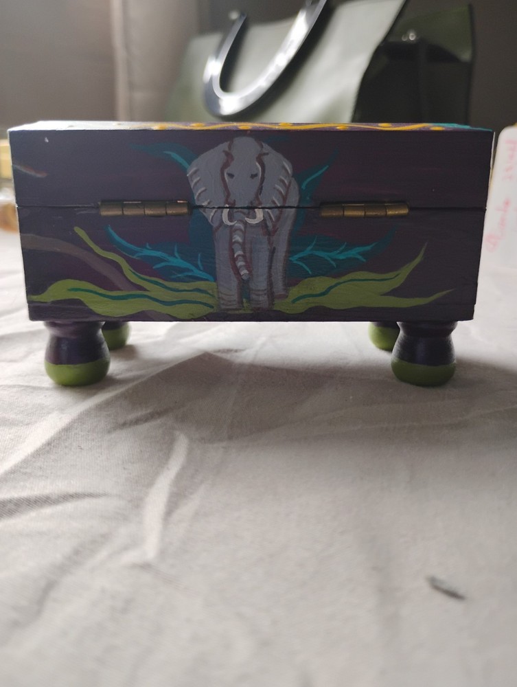 small painted box with tiger, elephant, zebra, lion, monkey