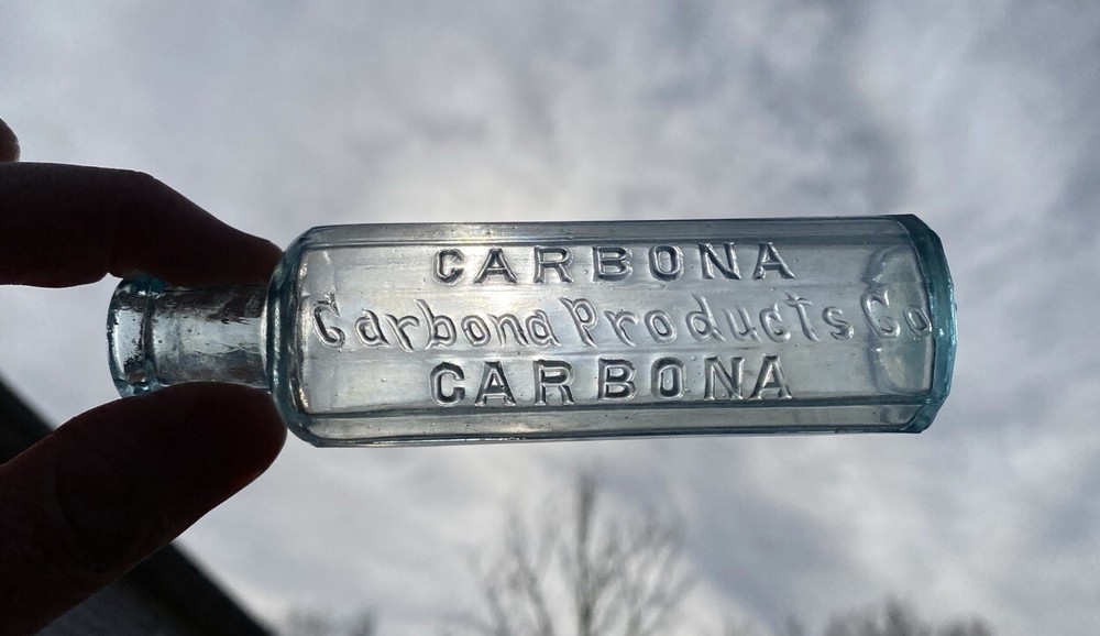 Carbona Products Co 12-sidesd Blown Bottle