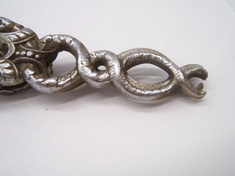 BRONZE SILVERPLATE NUTCRACKER W/ GROTESQUE LION ON FRONT OF HANDLE