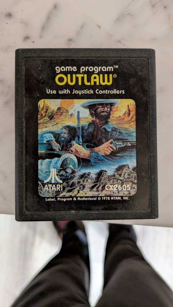 atari game, instructions, and limited 90 day warranty card bundle. no console