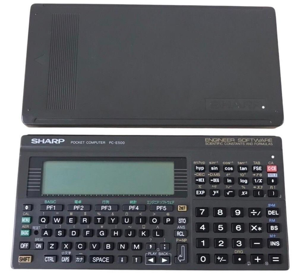 Sharp PC-E500 pocket computer 32KB memory large display BASIC language C338