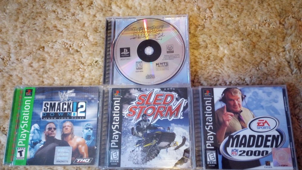PlayStation 1 console with games