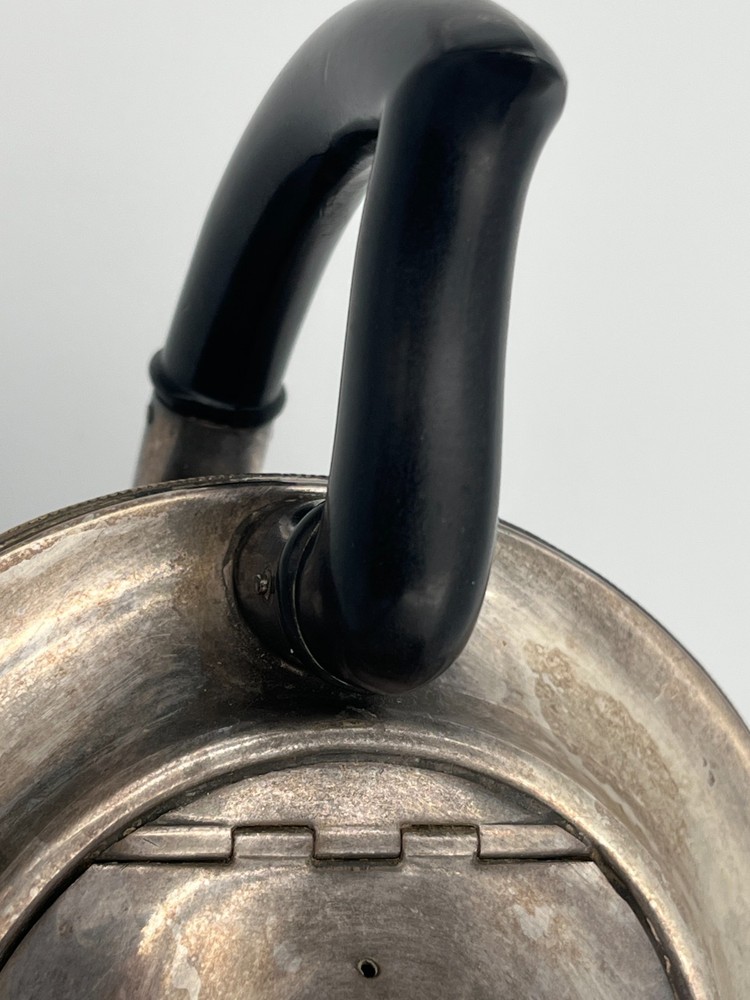 Antique silver plated teapot.