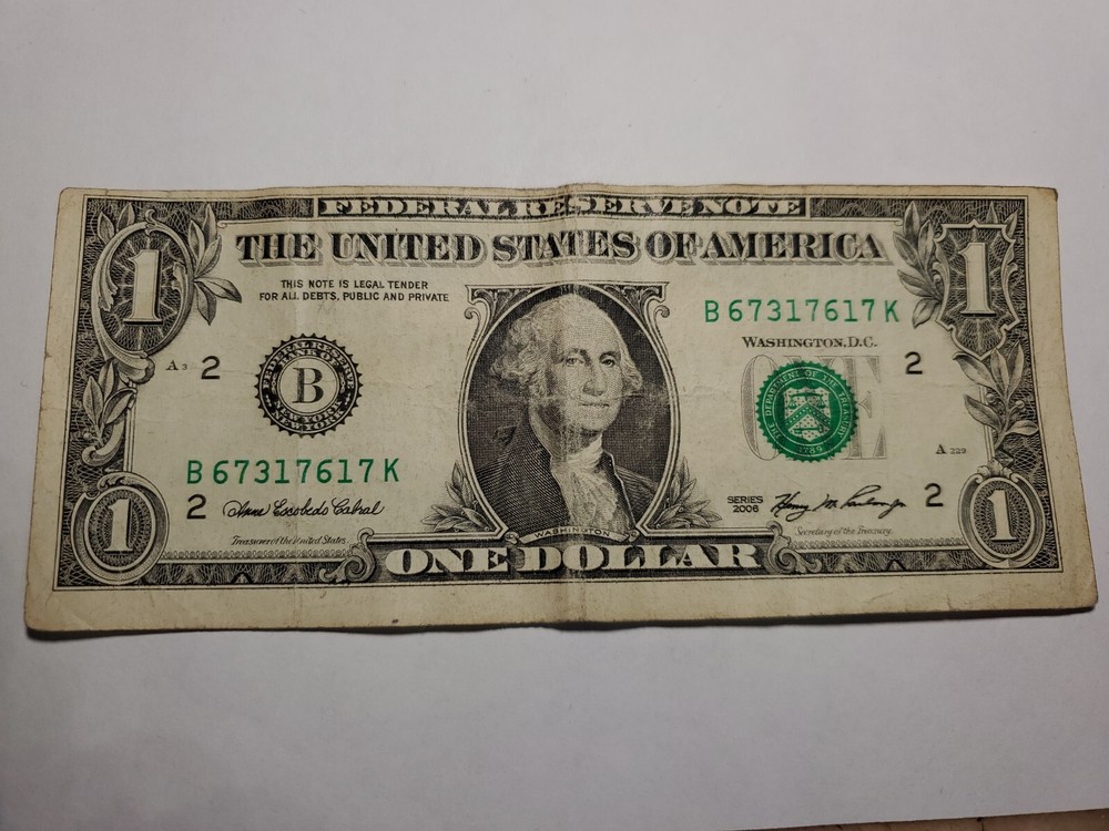 2006 misaline cut US $1 dollar bill