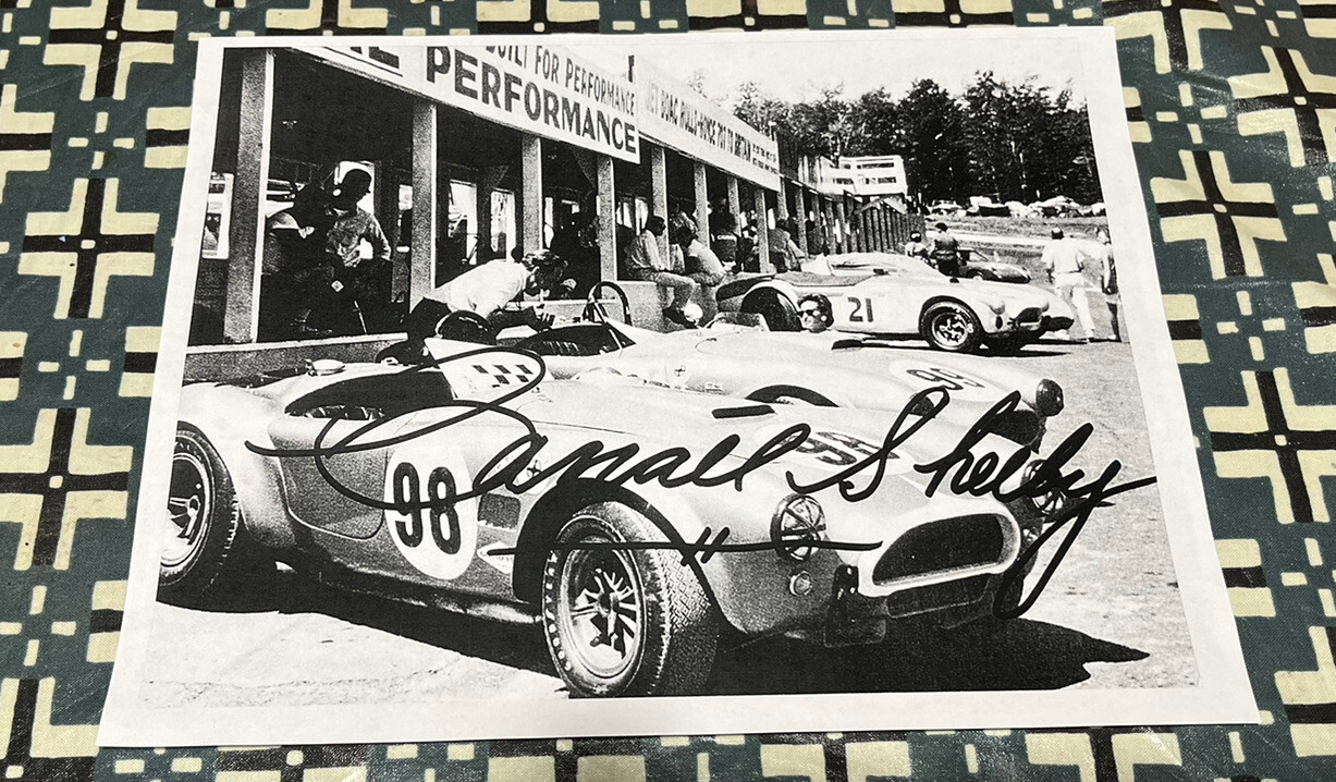 RACING 1960'S COBRAS POWERED BY FORD PHOTO WITH HUGE CARROLL SHELBY SIGNATURE!!