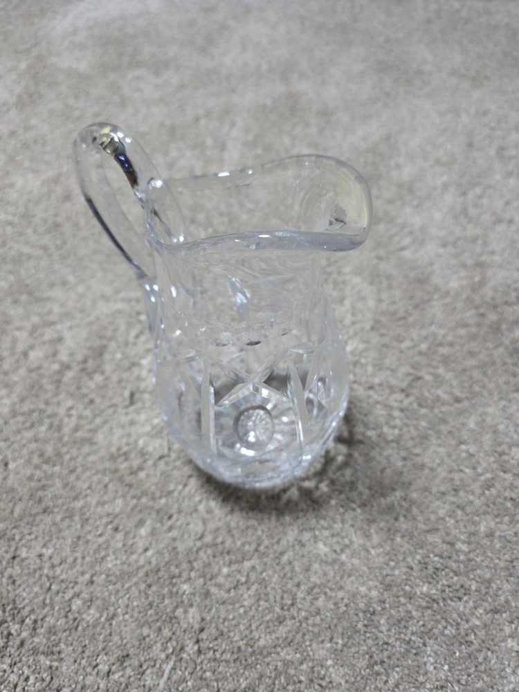 Vintage Edged Cut Glass Pitcher With Pinwheel Pattern.