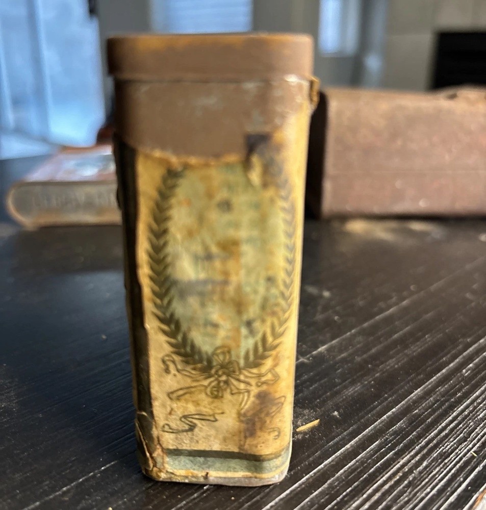 Antique tins Containers