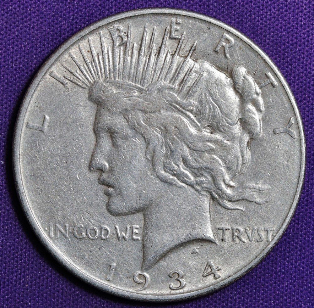 1934-d Peace Silver Dollar.  Error DDO. Dramatic Doubling Top 3 Rays RT.  209254