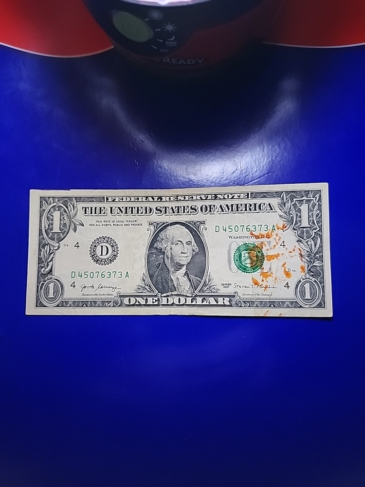 2017 $1 Note, Off-center Print Reverse, Orange Ink Contamination Error Obverse.