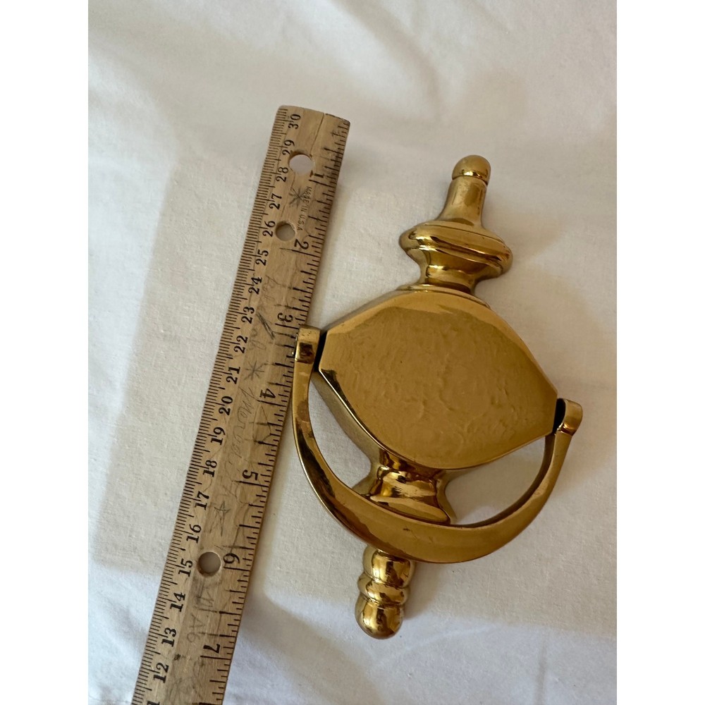 Shiny brass door knocker