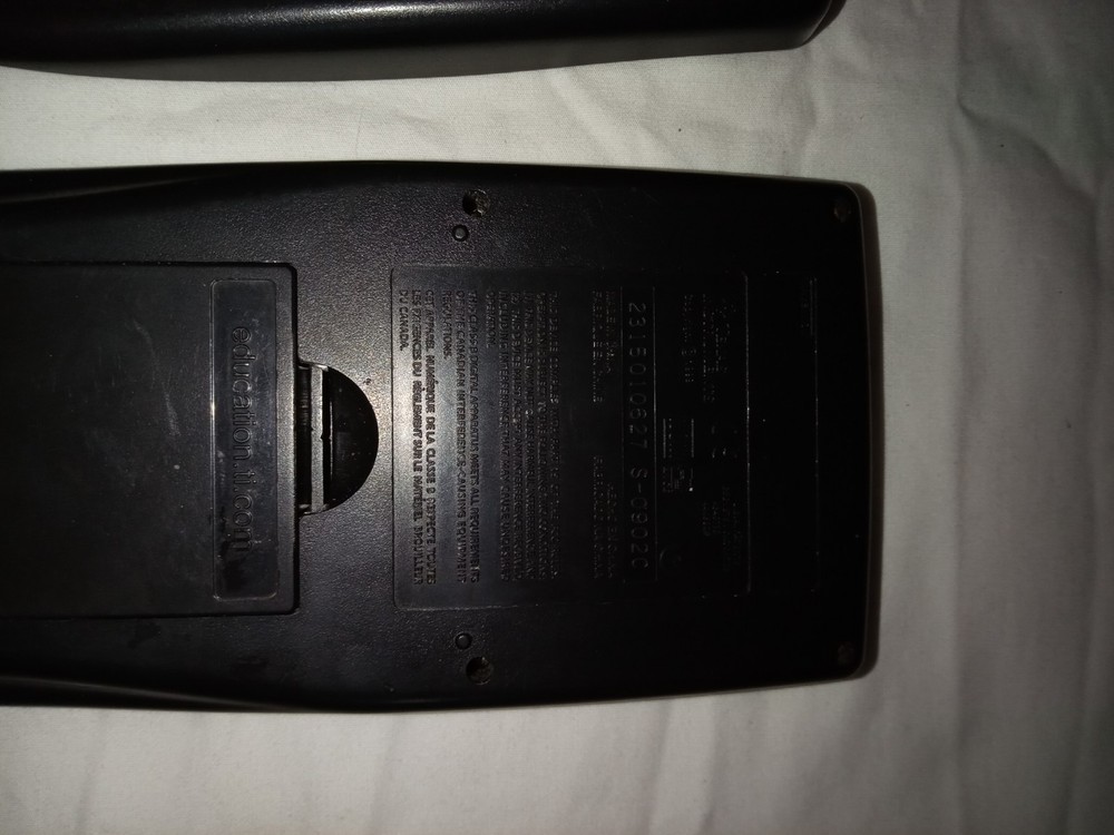 Texas Instruments TI-83 Plus Graphing Black Calculator With Cover unTested.
